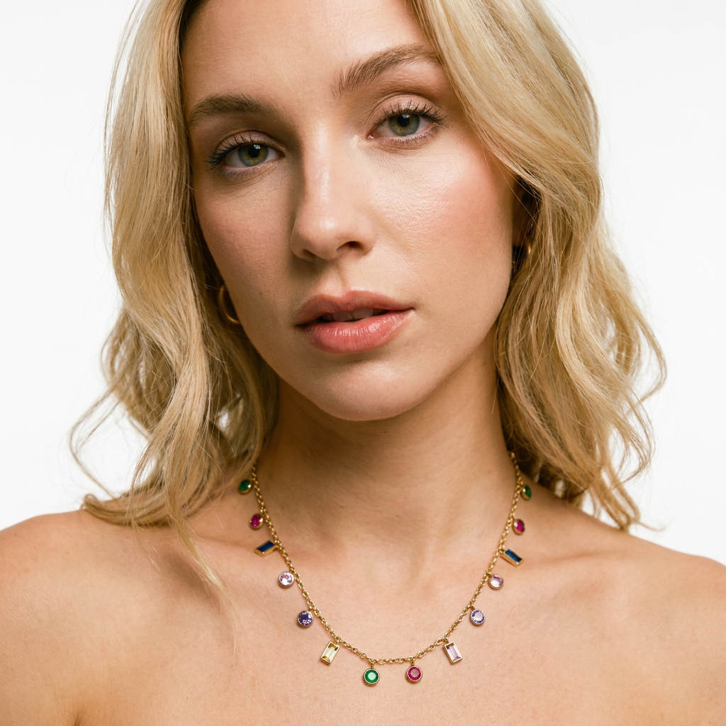 Blonde woman wearing gold multicolour crystal drop necklace at collarbone - waterproof jewellery - Kincha Designs London