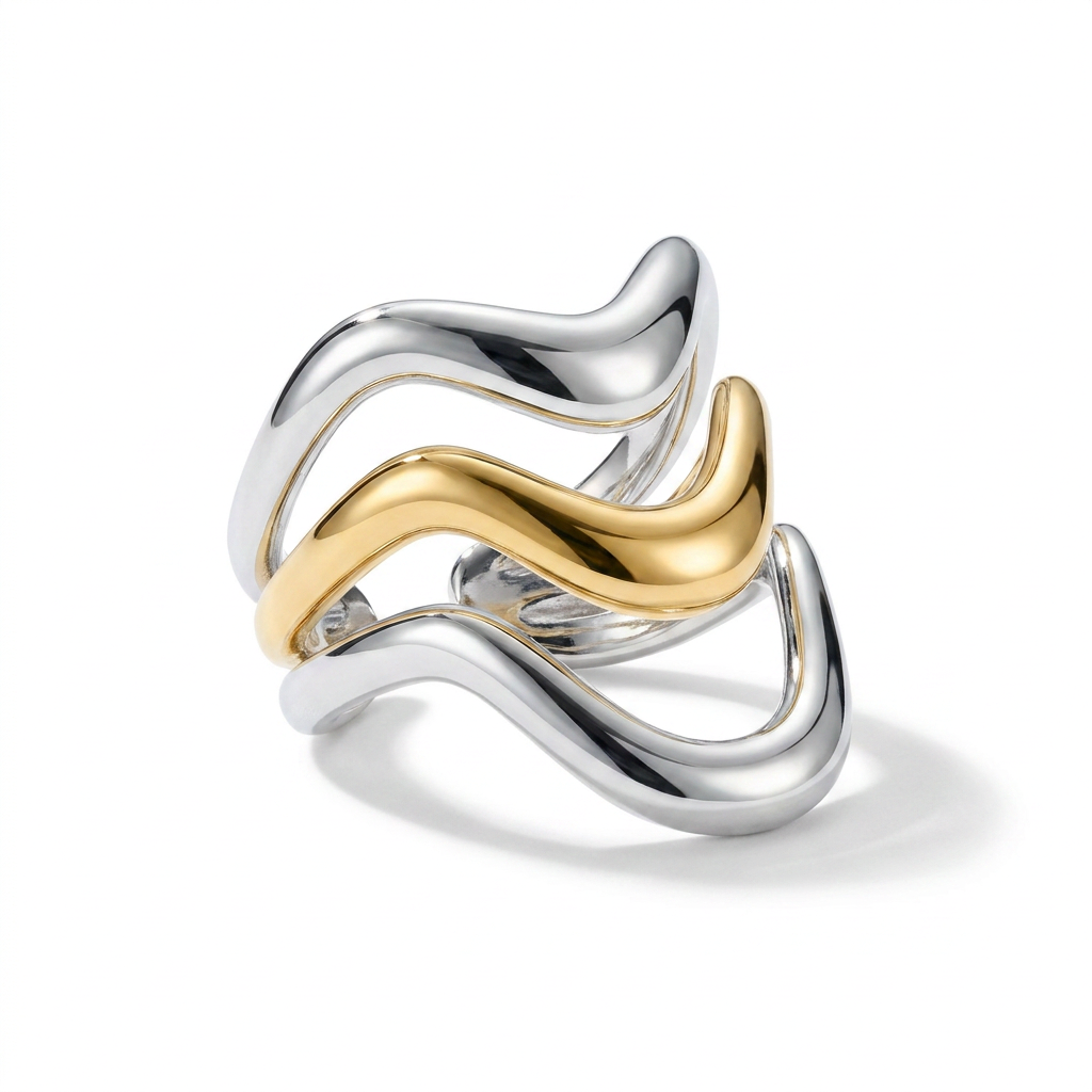 Two-tone wave ring silver and gold stainless steel angled product shot - Kincha Designs