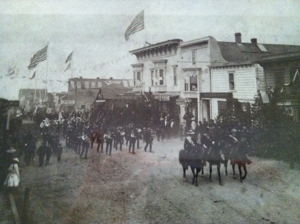 The building that houses the Headlands Inn was orignally located on Main St., Mendocino, Ca. Photo is 4th of July circa 1890.