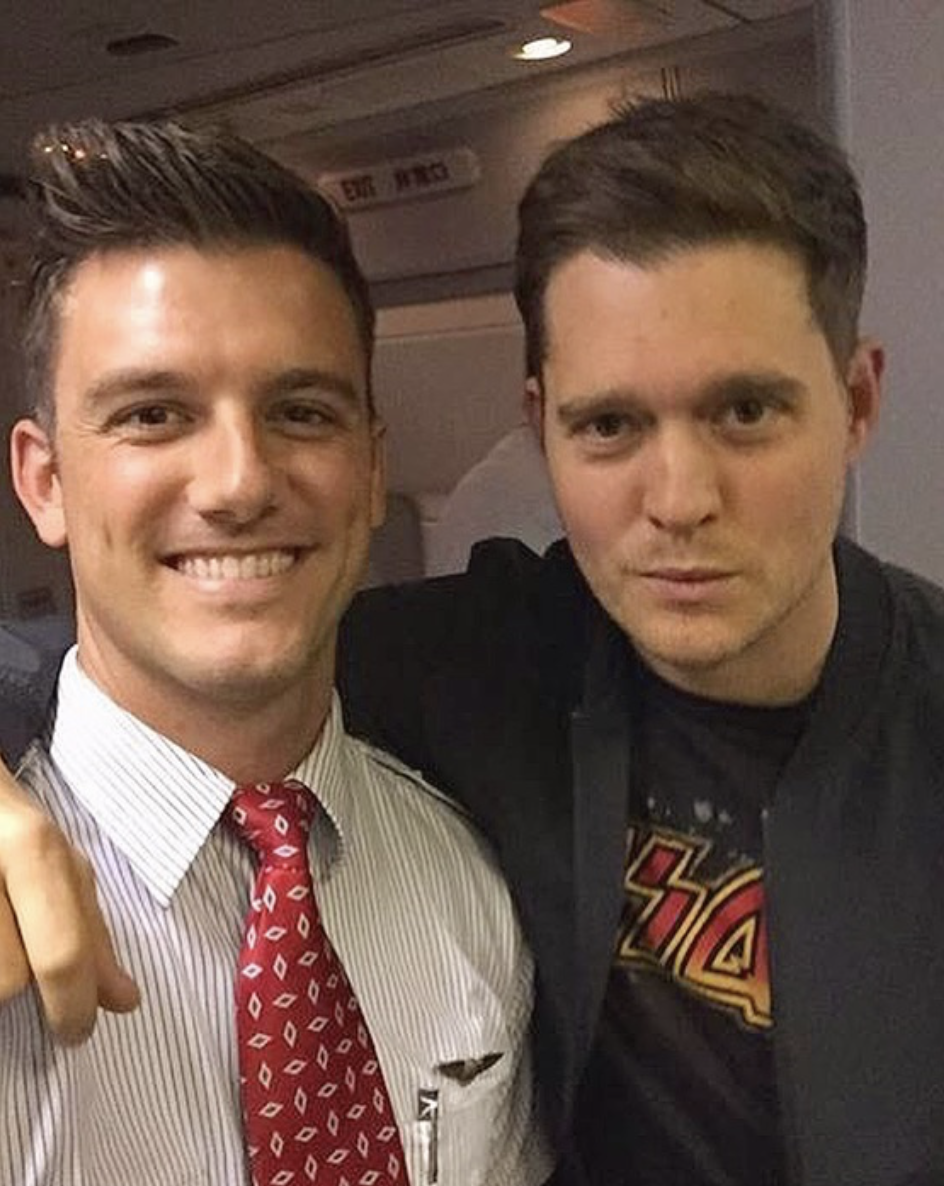 Alan Gendreau flashes a smile with fellow singer, Michael Bublé