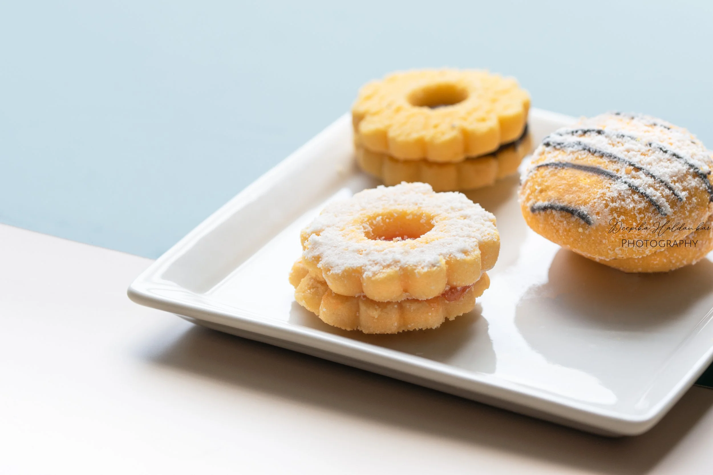 Butter cookies on a white plate