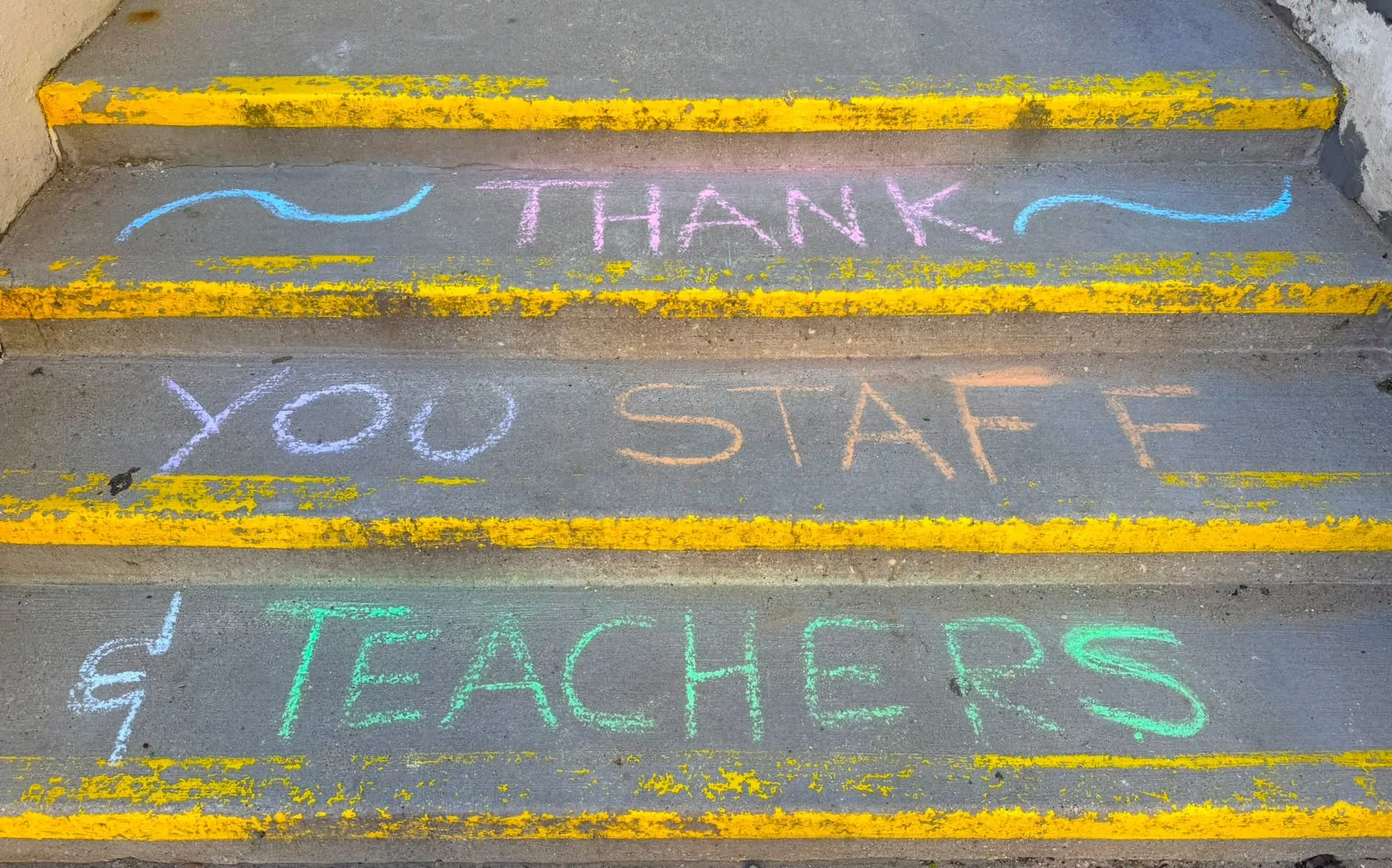 To kick of Teacher Appreciation Week, the kids showed their gratitude by welcoming teachers this morning with colorful chalk art.