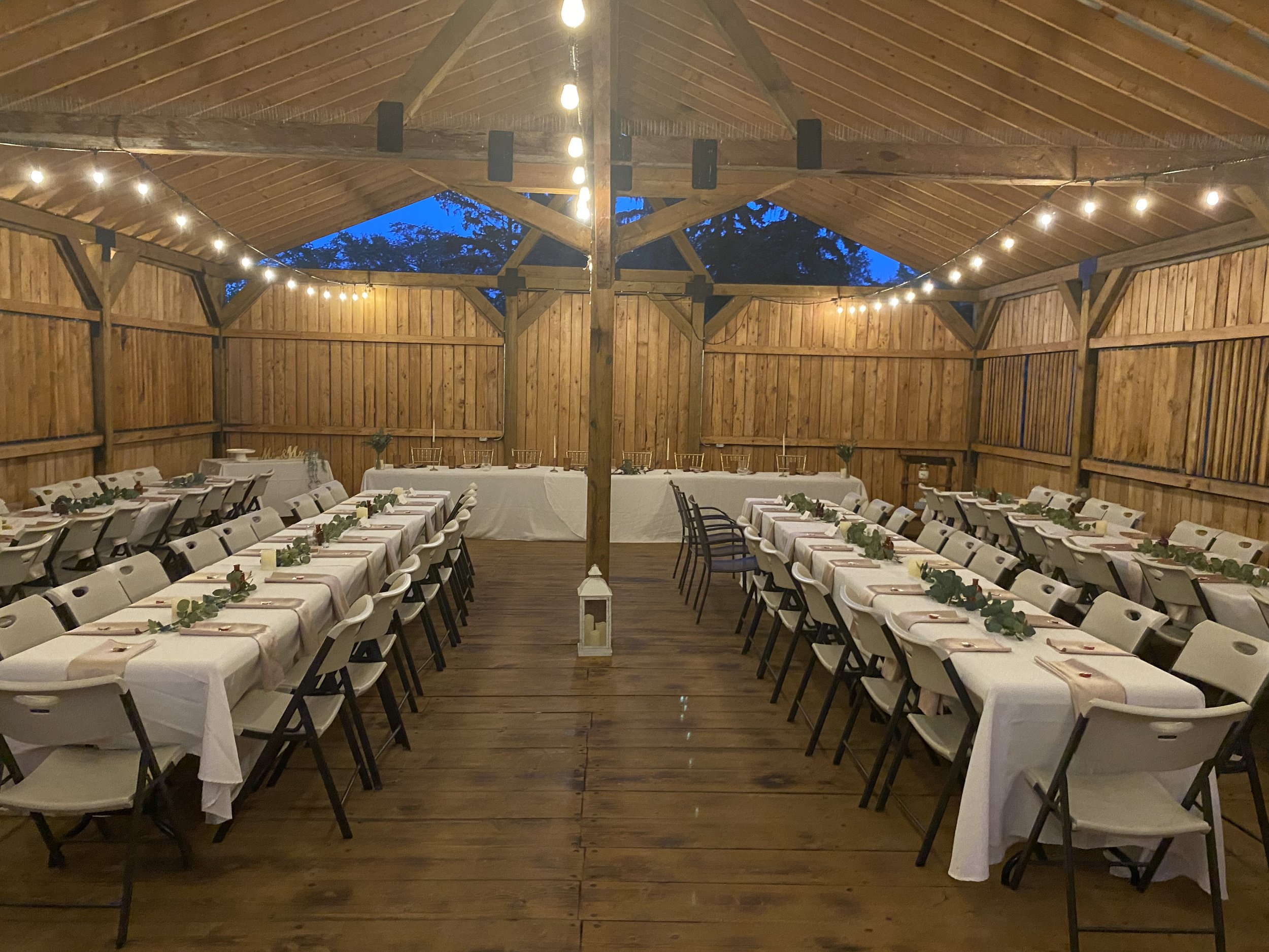 recption w 4 long table rows.jpeg