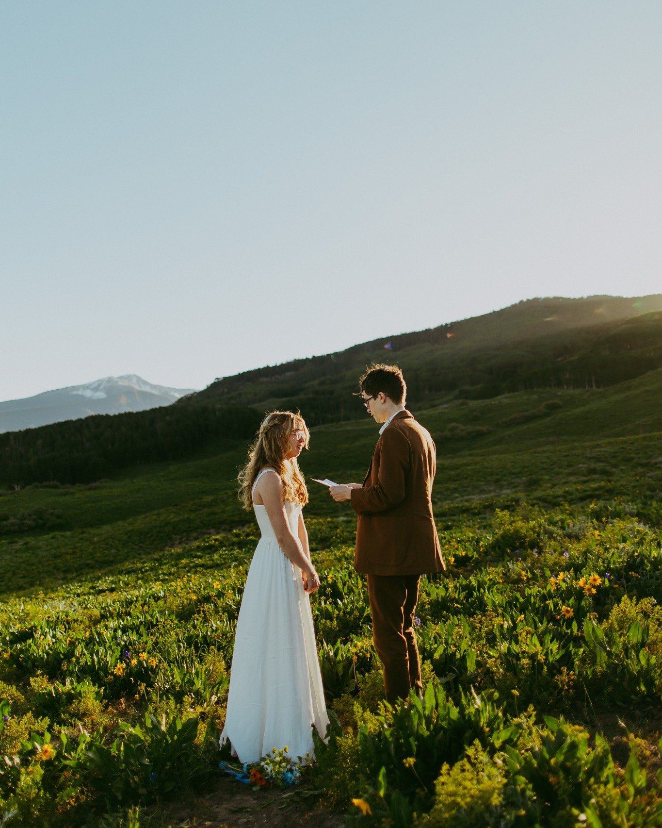 What is the best time of year to elope in Colorado? 🌸🌻🍁❄️

Let's take a look into all the seasons in Colorado, and which would be the best time to elope there!

🌻 Summer 🌻
Summer is by far my favorite time of year in Colorado. The warm air, wild