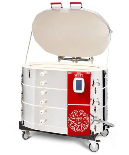 Skutt 1427 oval kiln with lid open on a rolling cart