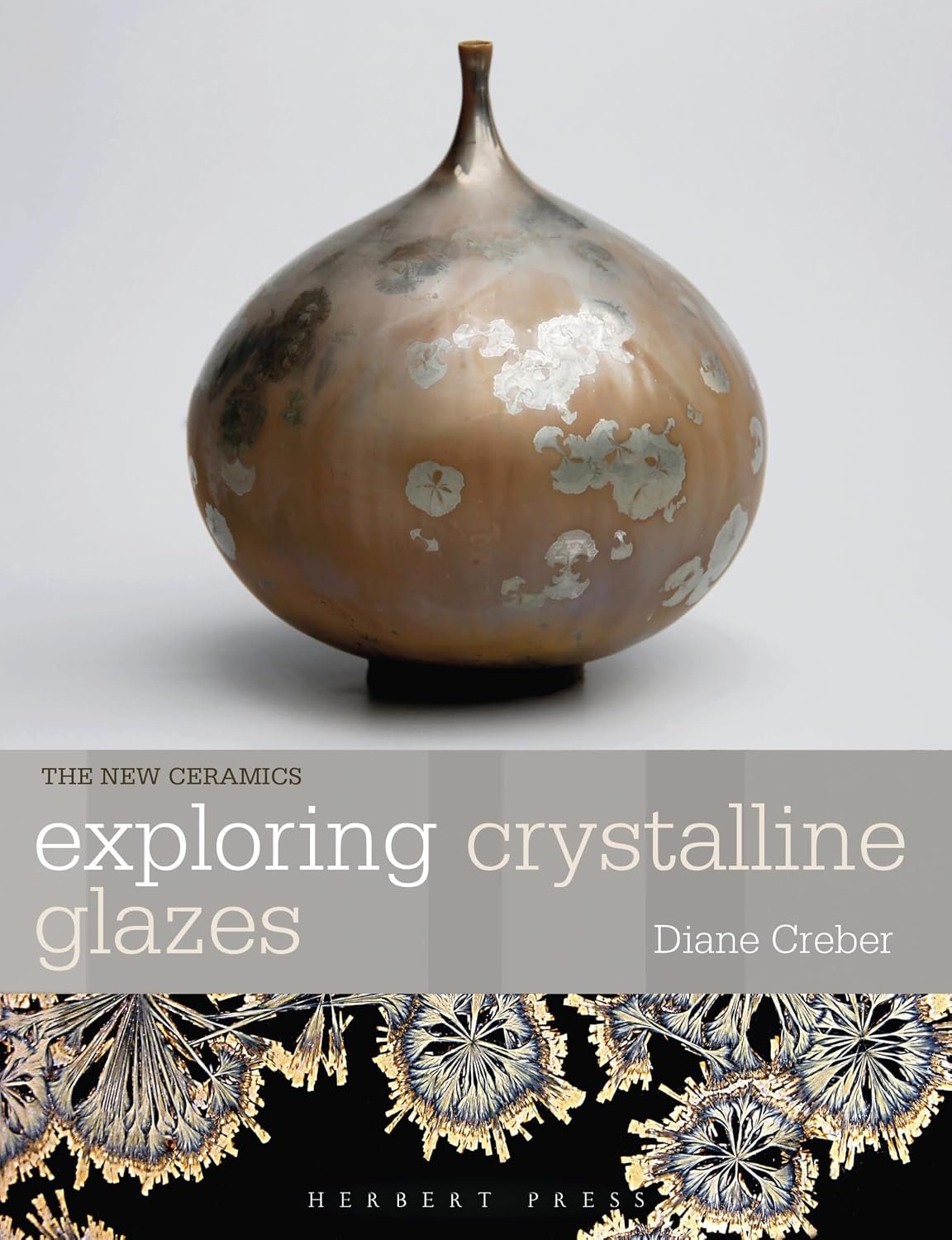 Exploring Crystalline Glazes book cover with a brown, crystalline glazed vessel above the title and below that a detail image of white and tan/yellow crystalline glaze on a black background
