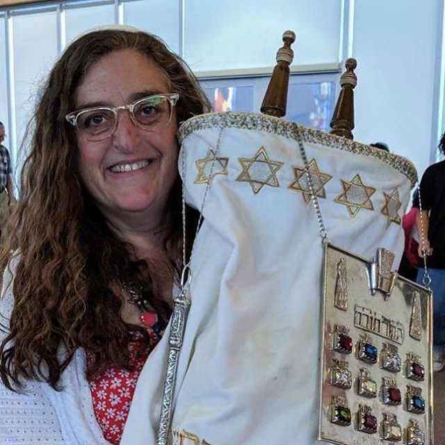 Carrying the Torah for the first time, and on Simchat Torah. #morahleora #nertamidsd #samsbloomlearningcenter #torah #simchattorah