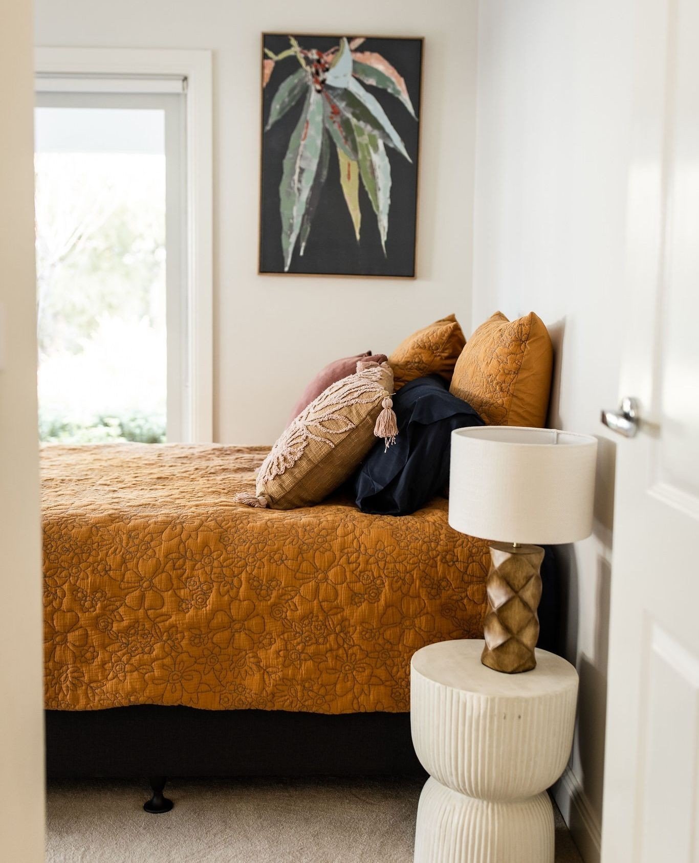 Terracotta linens, we can't get enough of them! Adding a statement look to a bedroom.