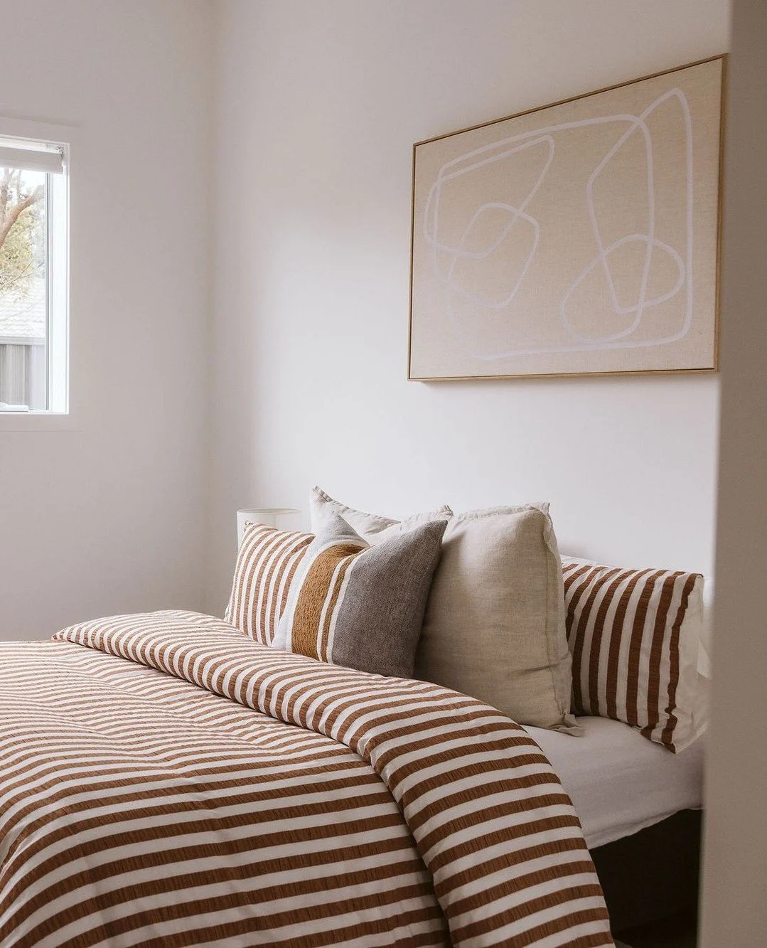 Fresh linen. Layered cushions. Soft lighting. Calm energy ✨⁠
⁠
Creating dreamy bedrooms is one of our favourite parts of styling a home.⁠
⁠
The bedroom should feel like a retreat &mdash; relaxed, welcoming and beautifully put together without trying 