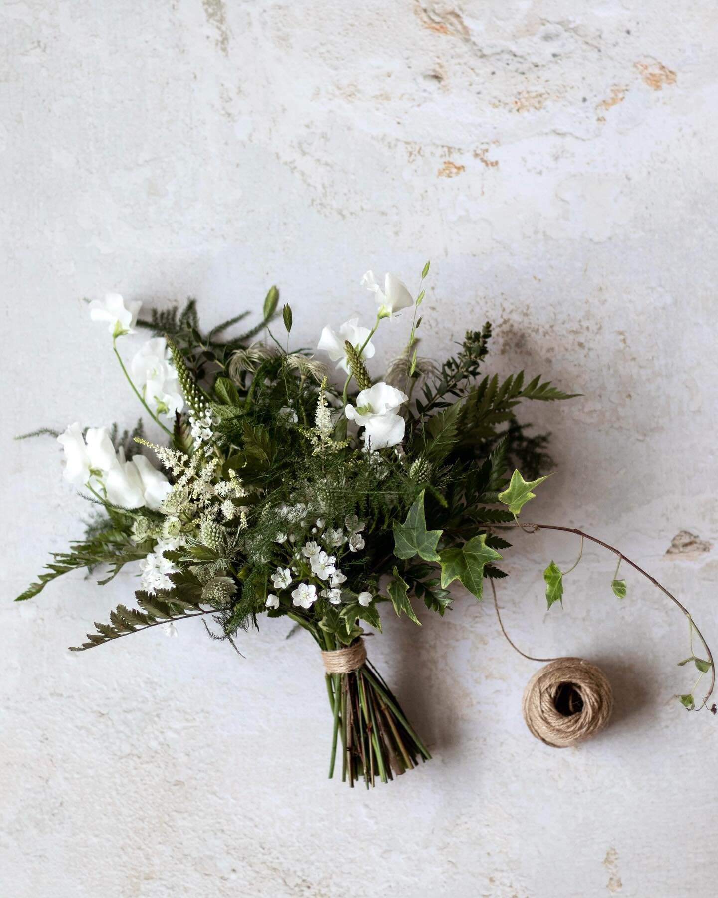 &bull; green leafy botanicals &bull;

Something a little different for me - an almost all foliage bouquet; this one for bridesmaid Ella - lots of different varieties of fern, rosemary, mint, fluffy seed heads, oat grass and variegated ivy with a ligh