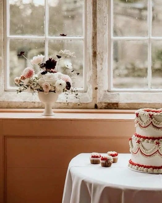 | earthy autumn vibes 🤎&bull;

cake + flowers; always a winner with me.

Some velvety &amp; chocolatey October colour in front of a misty 16th century window @holmepierrepont 

Photo by @karencatchpole for Alice &amp; Stuart @medievalflump 🤍
Cake b
