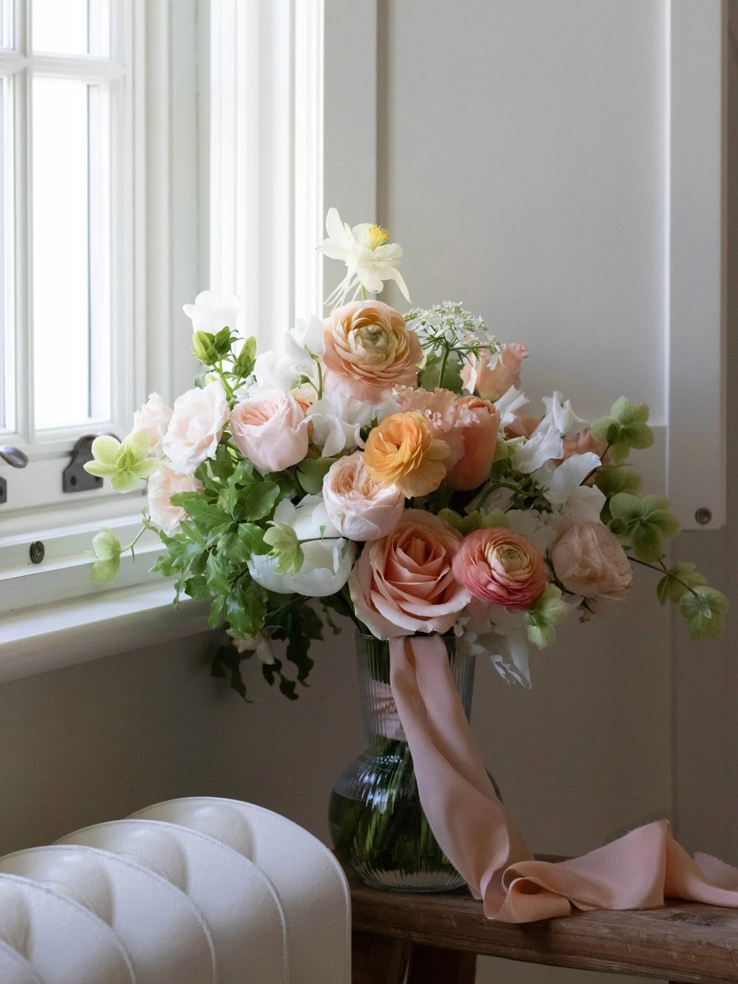 | apricot sorbet 🍧&bull;

that sweet spot in early May when ranunculus, lime citrus hellebores, early sweet peas and peonies overlap.

For Di + Mal and an intimate wedding gathering on a sunny late spring day @vicarageboutique this weekend 🍑.

Brit