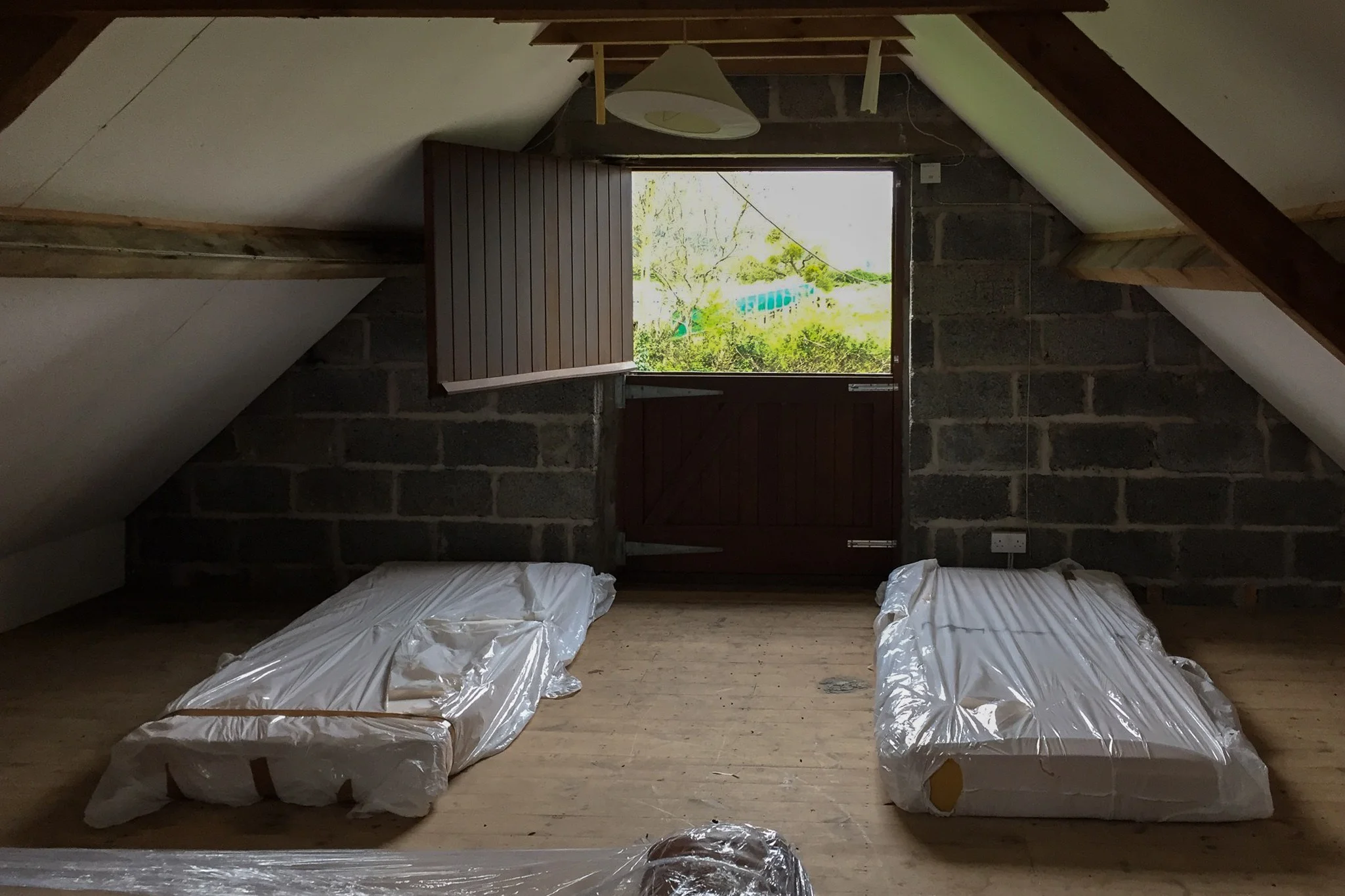The bedrooms are not exactly spacious, but there’s room enough for two!