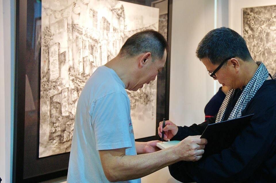  Tung Yue Nang autographing art catalogue titled Silence  