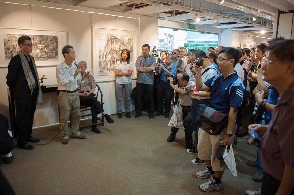  Mr Choy Weng Yang addressing attendees during Mr Tung Yue Nang’s   Silence   Exhibition  