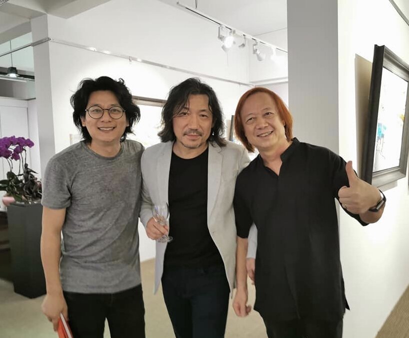  Zhu Hong (Centre) with fellow artist Wang Mo Ping (Right) and Liu Xuan Qi (Left) 