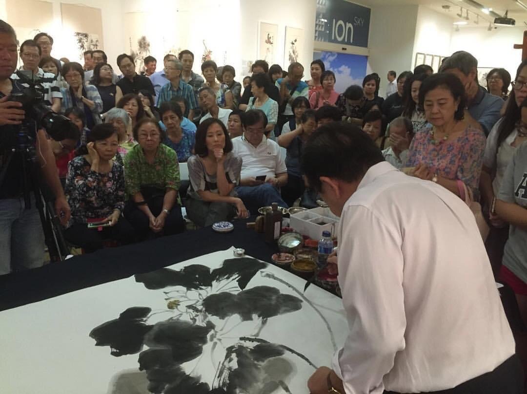  Mr Nai Swee Leng carrying out a live painting demonstration during his solo exhibition in 2016  