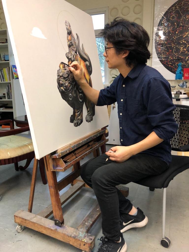  Liu Xuan Qi working in his studio 