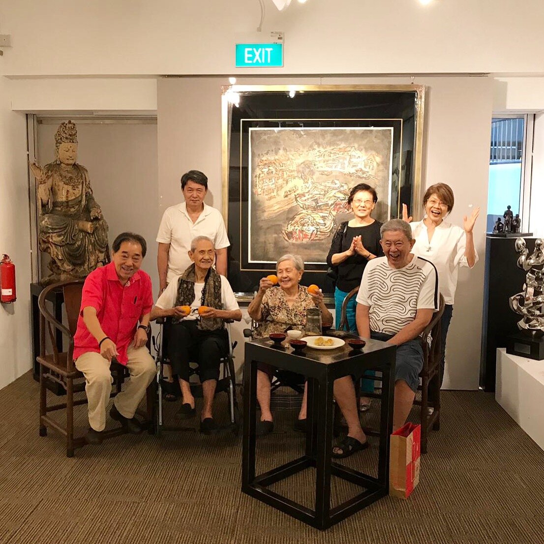 Mr Lim Tze Peng and his family at the gallery 