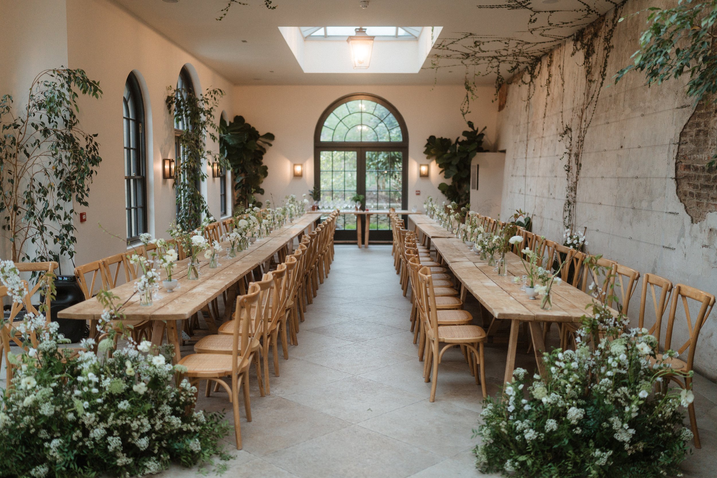 Beautiful whimsical wedding scene created by honour farm flowers for wedding couple at the fig house, middleton lodge.