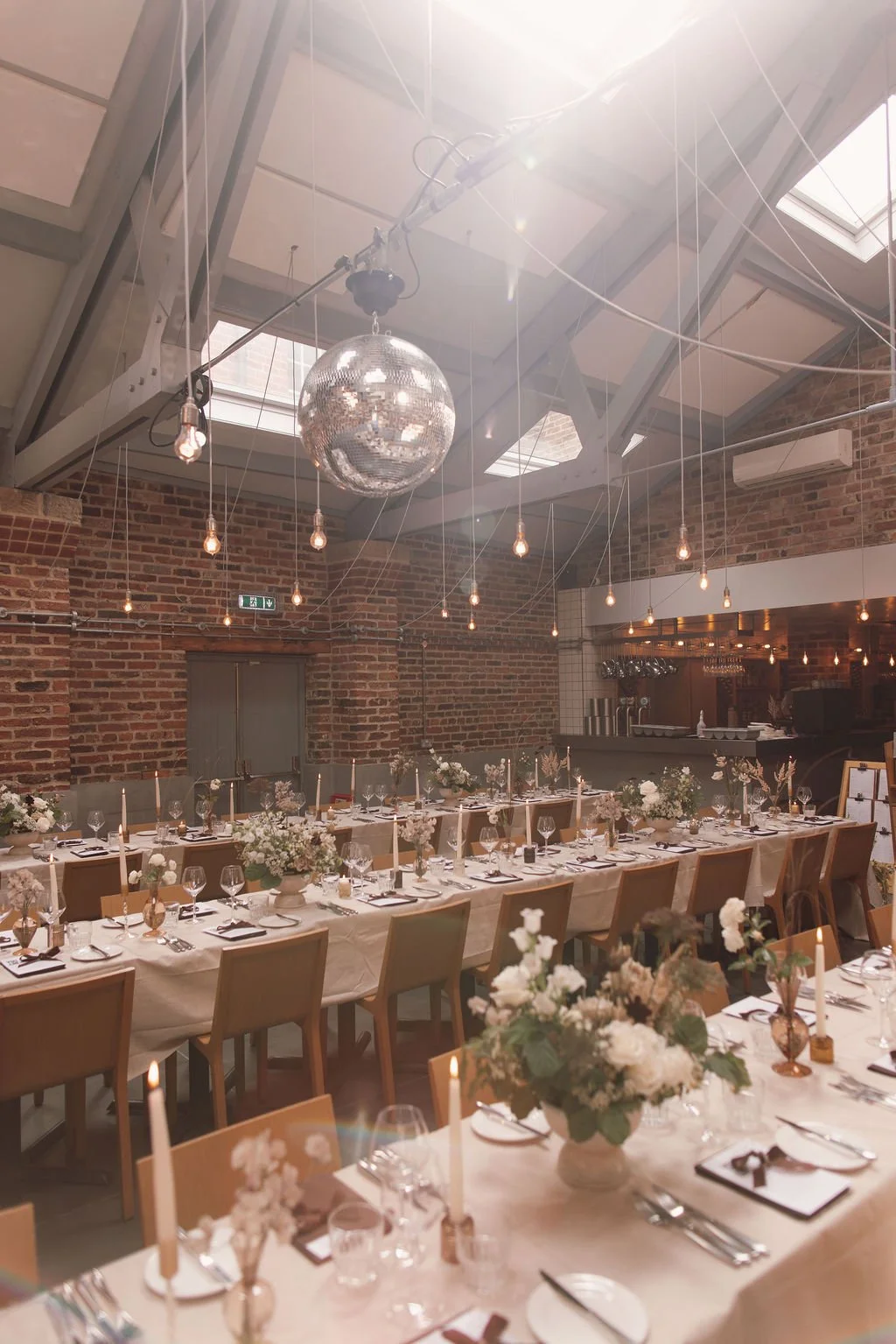 Beautiful flower arrangements by honour farm flower for leeds city centre wedding at shears yard leeds.