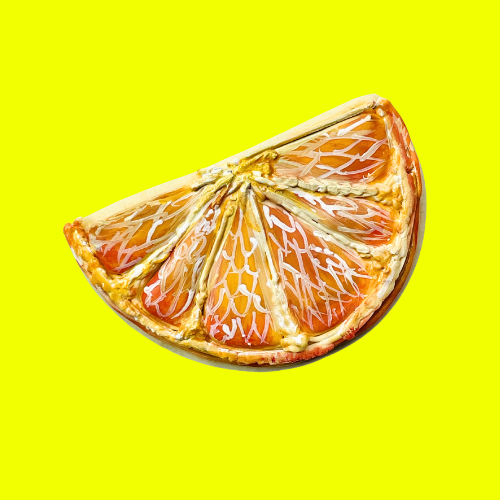 orange slice sugar cookie yellow background.png