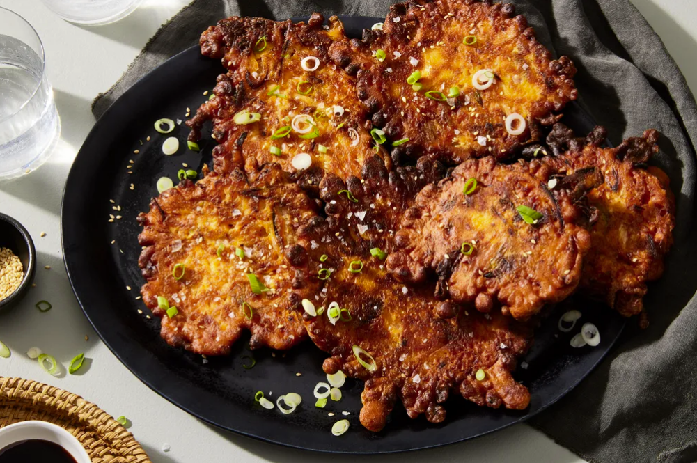 FOOD52: KIMCHIJEON (KIMCHI PANCAKES). PHOTO: ROCKY LUTEN. PROP STYLIST: FIONA CAMPBELL. FOOD STYLIST: ANNA BILLINGSKOG.