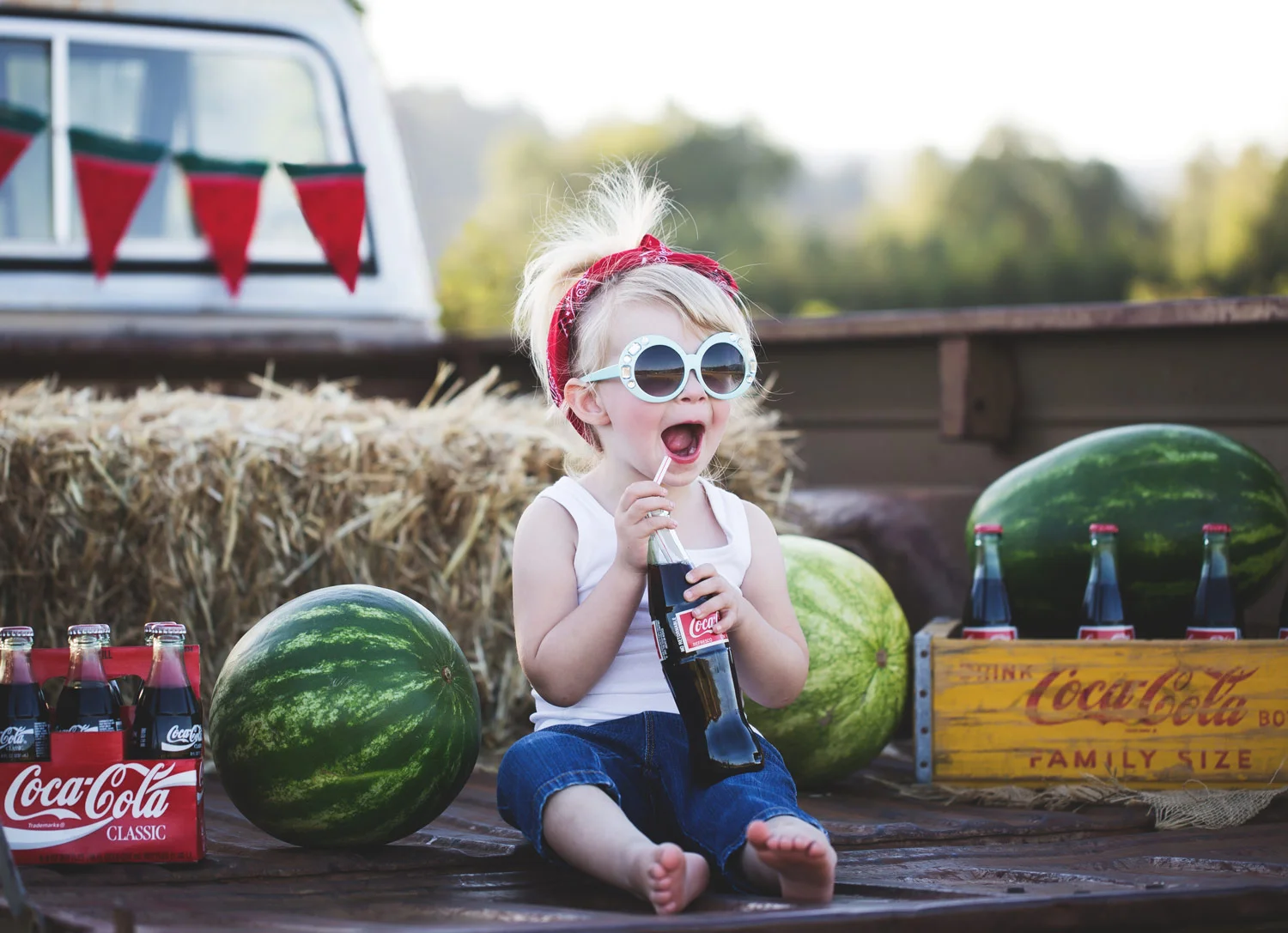 Little-Girl-Drinking-Coke-Truck-Bed.jpg