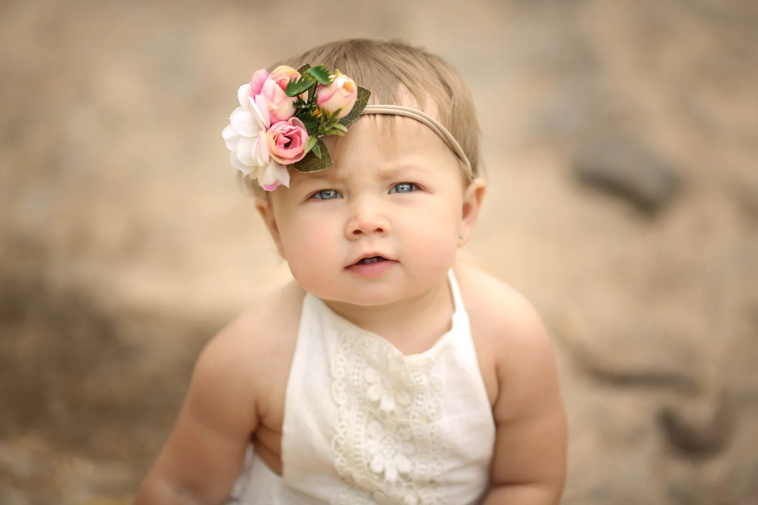 Little-Girl-Closeup-Eyes-Wearing-Flowers.jpg