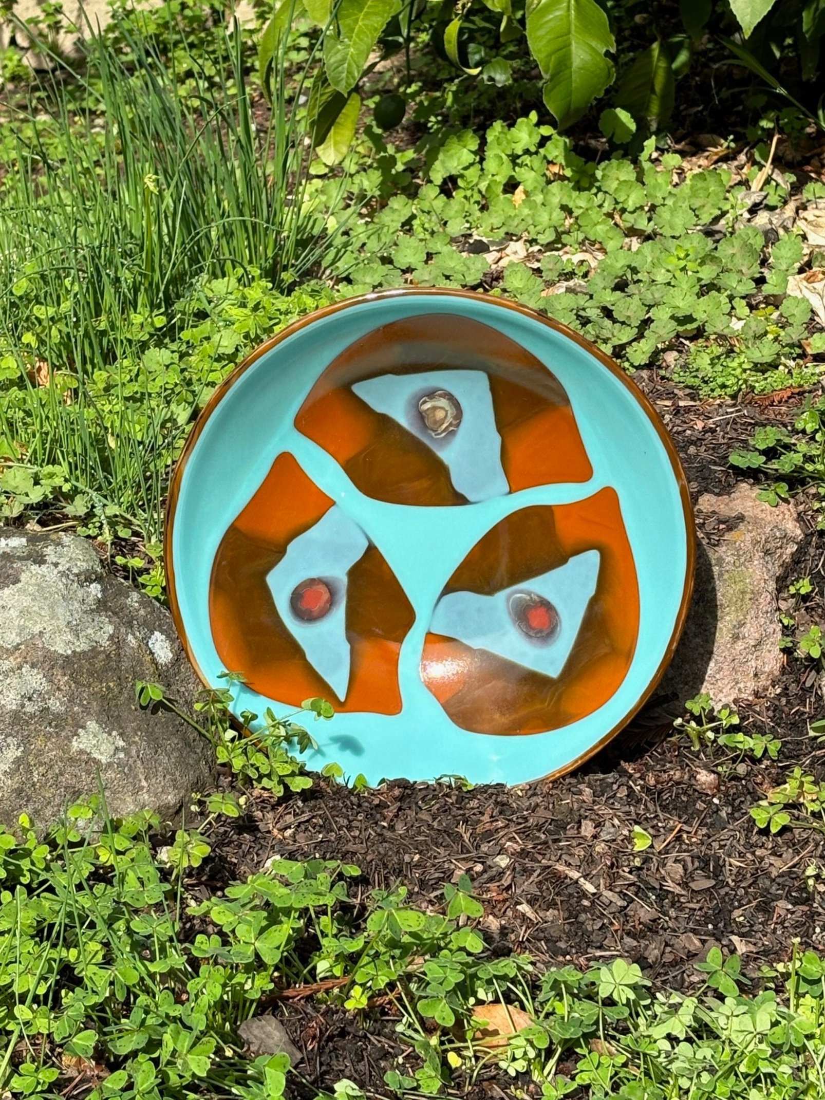 Robin%27s+egg+blue+on+brown%2C+woodland+opal%2C+ivory%2C+black+streaky+base+with+woodland+brown%2C+Robin%27s+egg+blue%2C+petrified+wood+accents+10.5+in+diameter+x+2.75+in+h.jpg