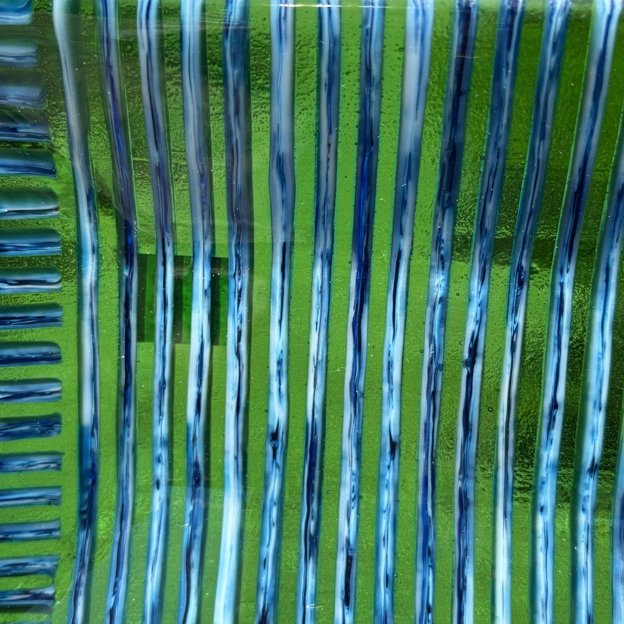 Lt green trans, blue_black streaky  close up.jpeg