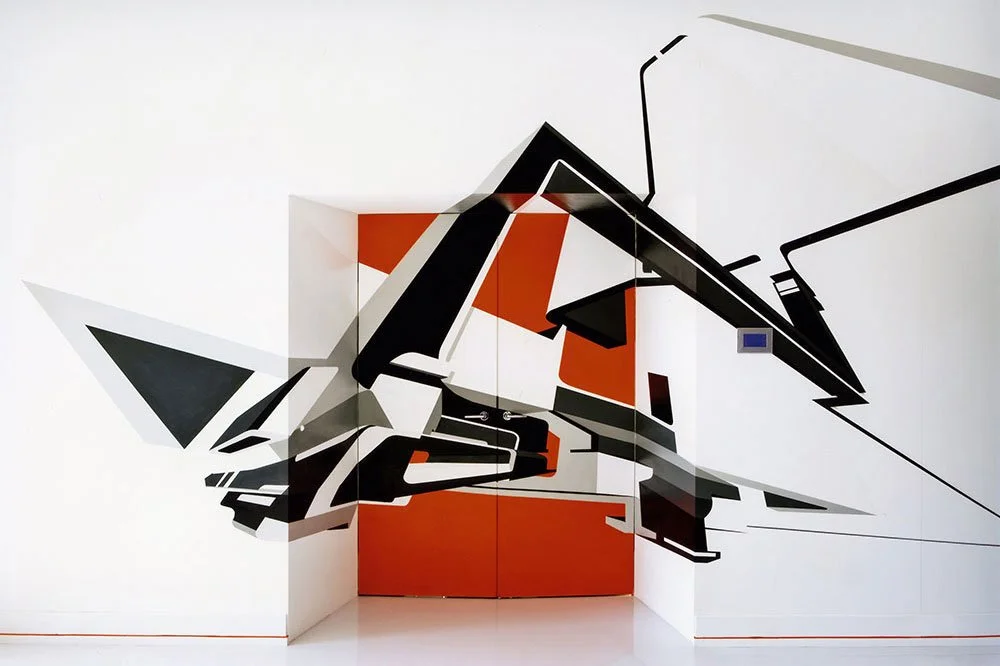 Mural on a door made of three-dimensional geometric graffiti letters in black, gray, and orange in a modern apartment.