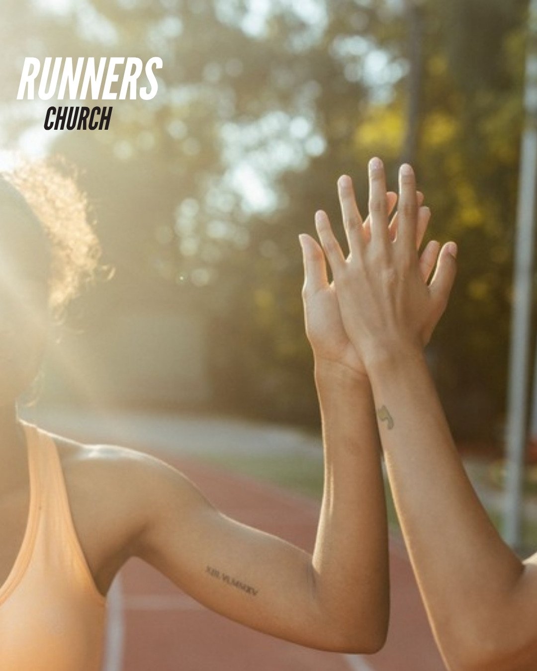 Two runners on a trail, one encouraging the other, representing success as helping others grow rather than winning.
