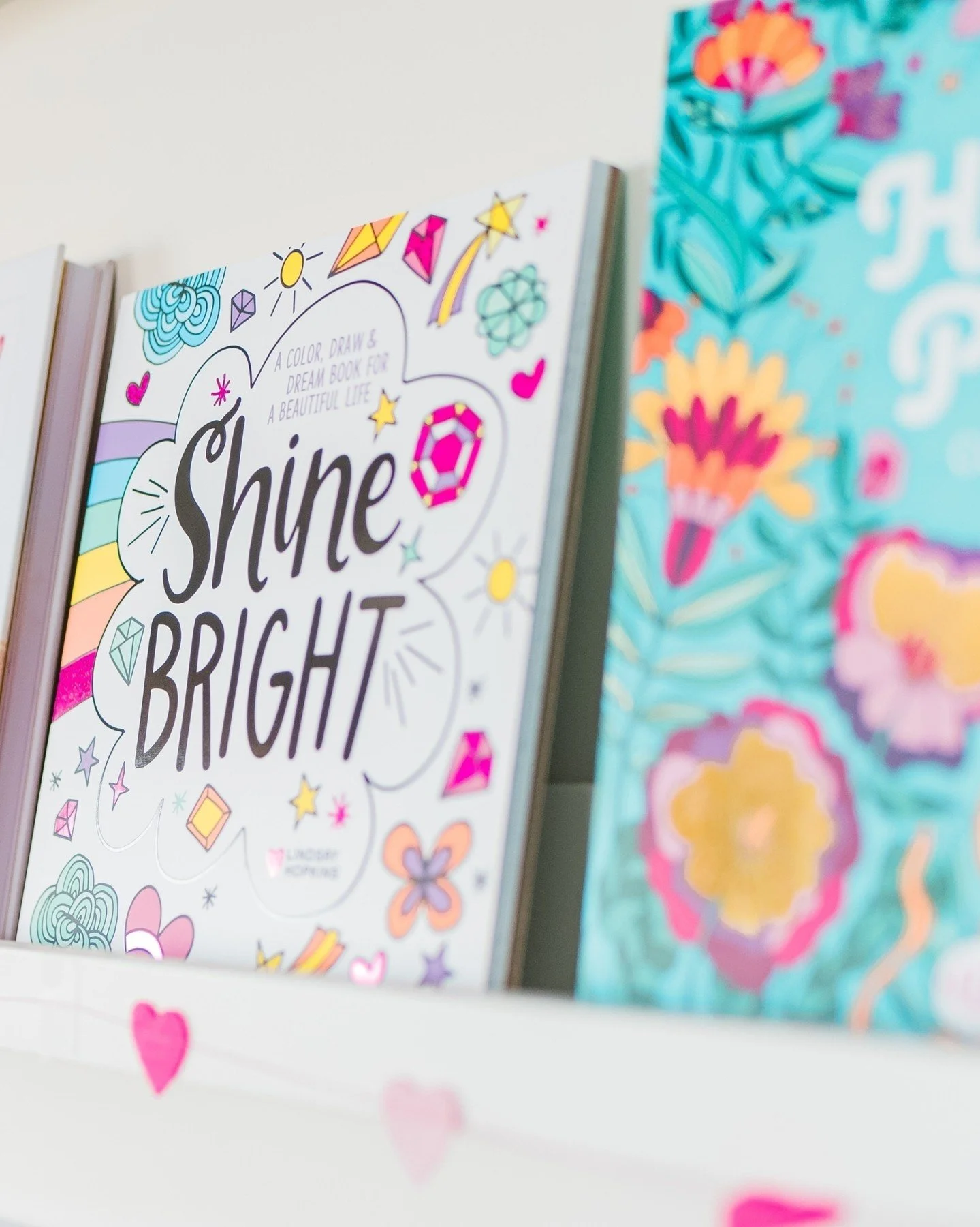 Don't forget to SHINE BRIGHT! This art activity book by Lindsay Hopkins of @pen_and_paint is filled with rainbows, unicorns, mermaids, kittens, llamas, and so much more! Each chapter focuses on positive traits like kindness, creativity, and bravery w