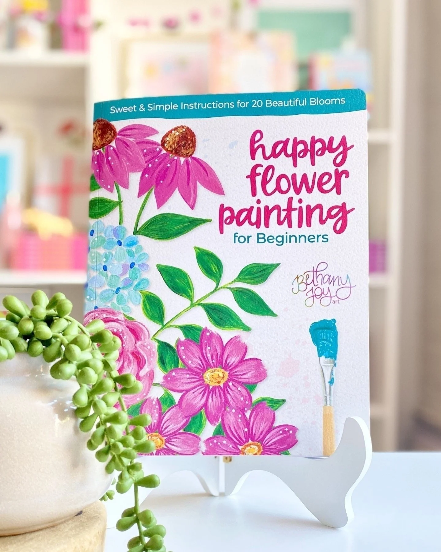 With HAPPY FLOWER PAINTING FOR BEGINNERS by Bethany Joy Adams of @bethanyjoy_art, you can paint so many of the beautiful flowers sprouting up this season! 

Learn to paint 20 different blooms, and then combine them in 10 floral compositions, includin