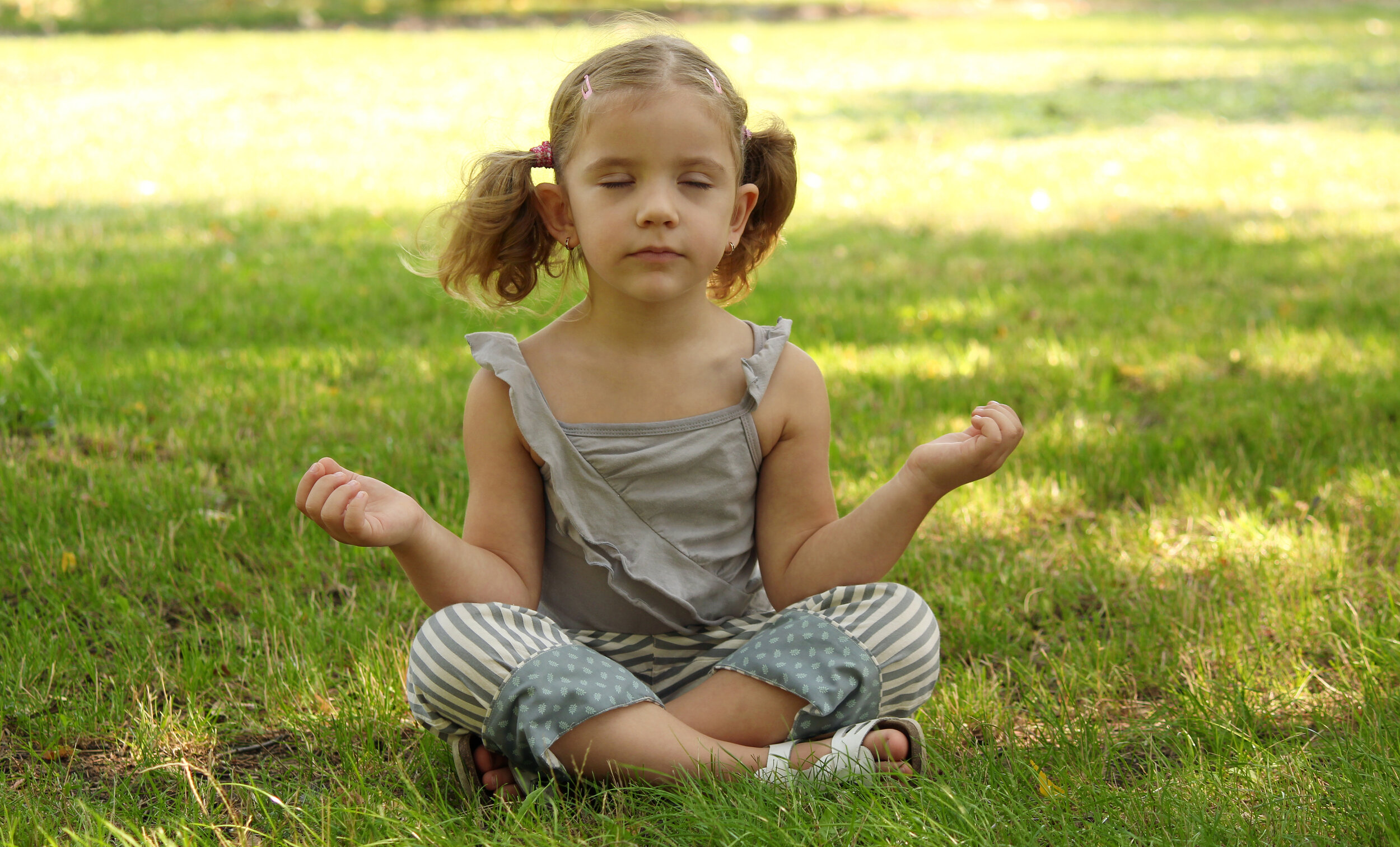 Canva - Little Girl Meditating .jpg