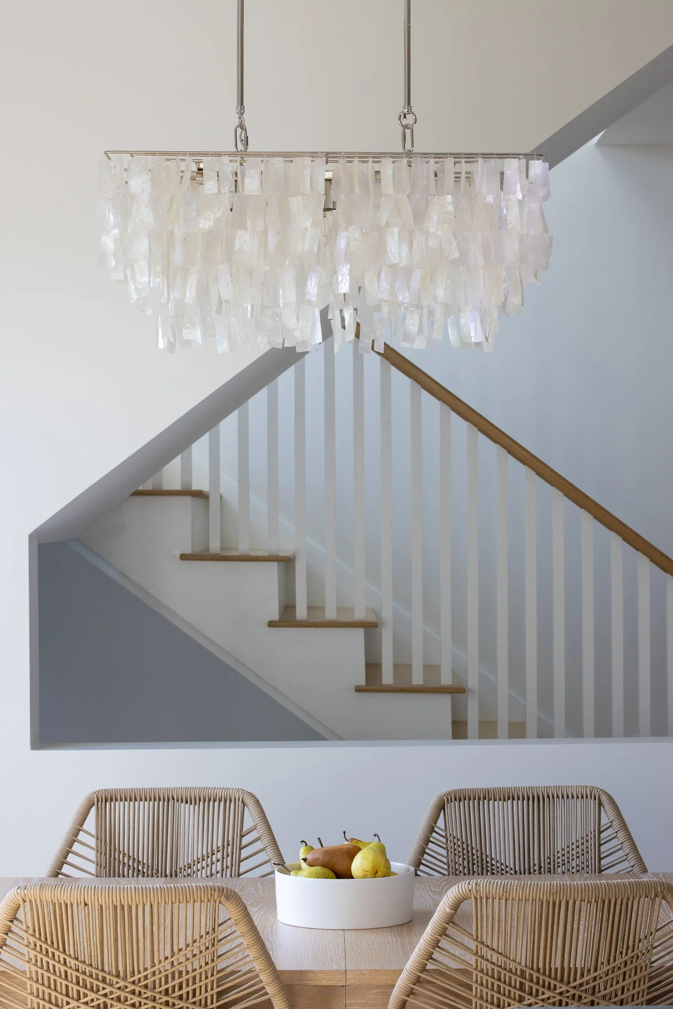 2-design 2 order julie h sheridan interior design coastal canvas dining room table and capiz shell light fixture closeup.jpg