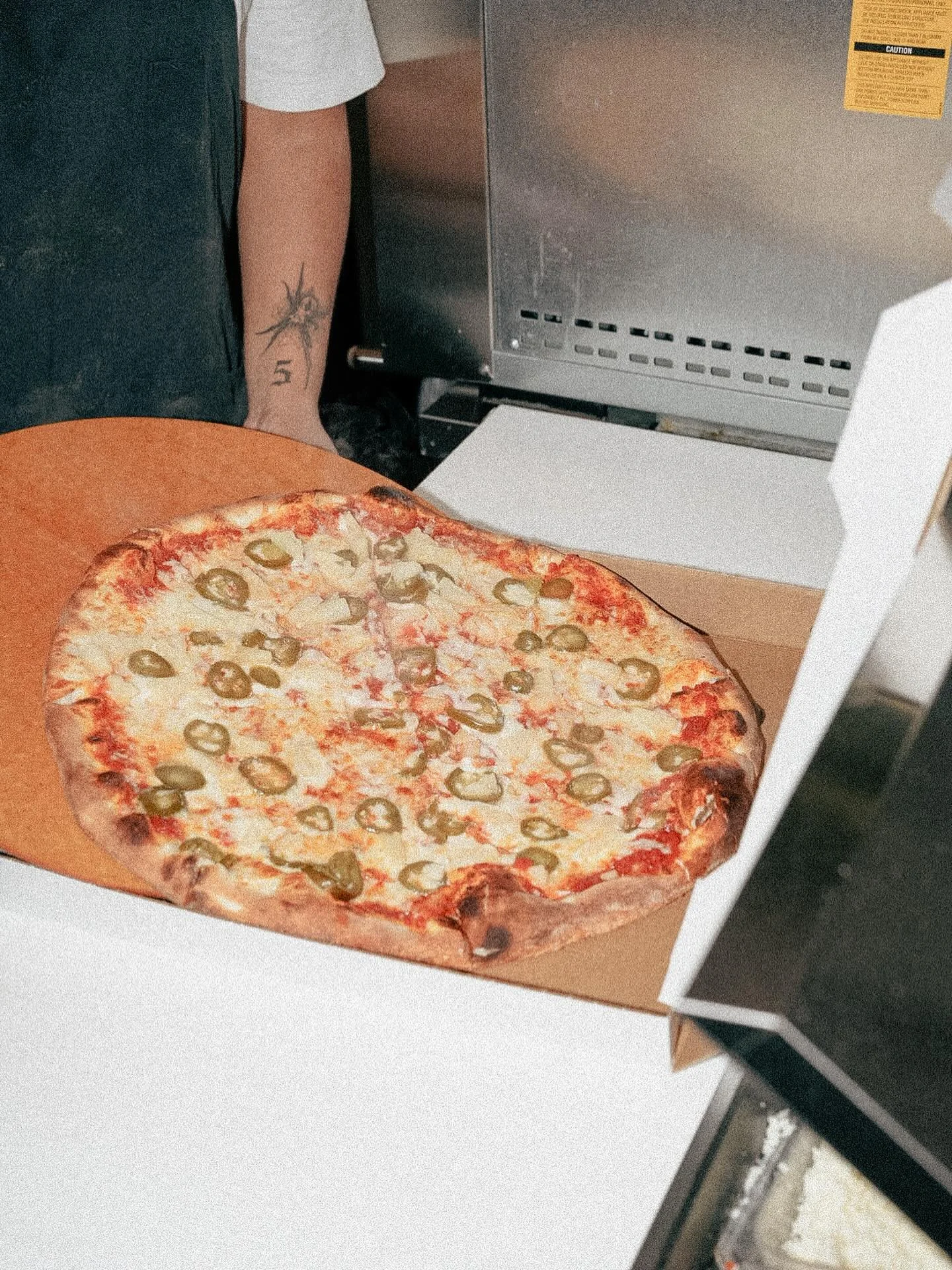 Build Your Own Pizza at Slice Project 

1. Start with your cheese base 
2. Add toppings of your choice 
3. Mix and match any combo works if it shares the same sauce

This customer got a pineapple and jalape&ntilde;o pizza. There&rsquo;s thousands of 