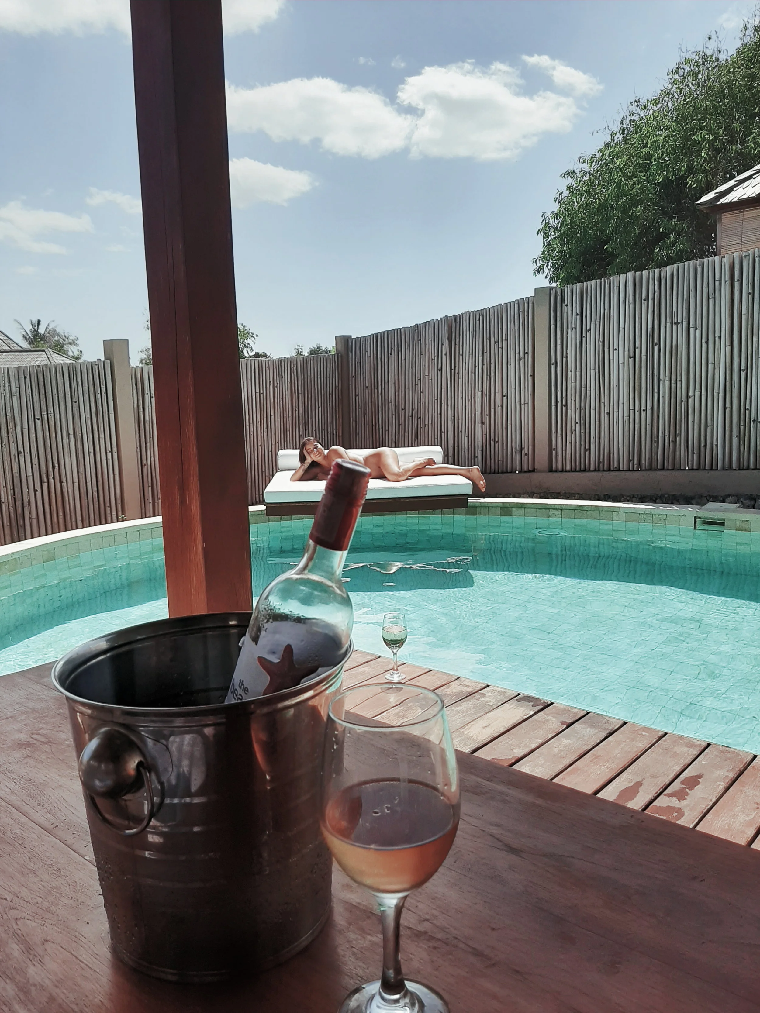 girl relaxing by the pool.jpg