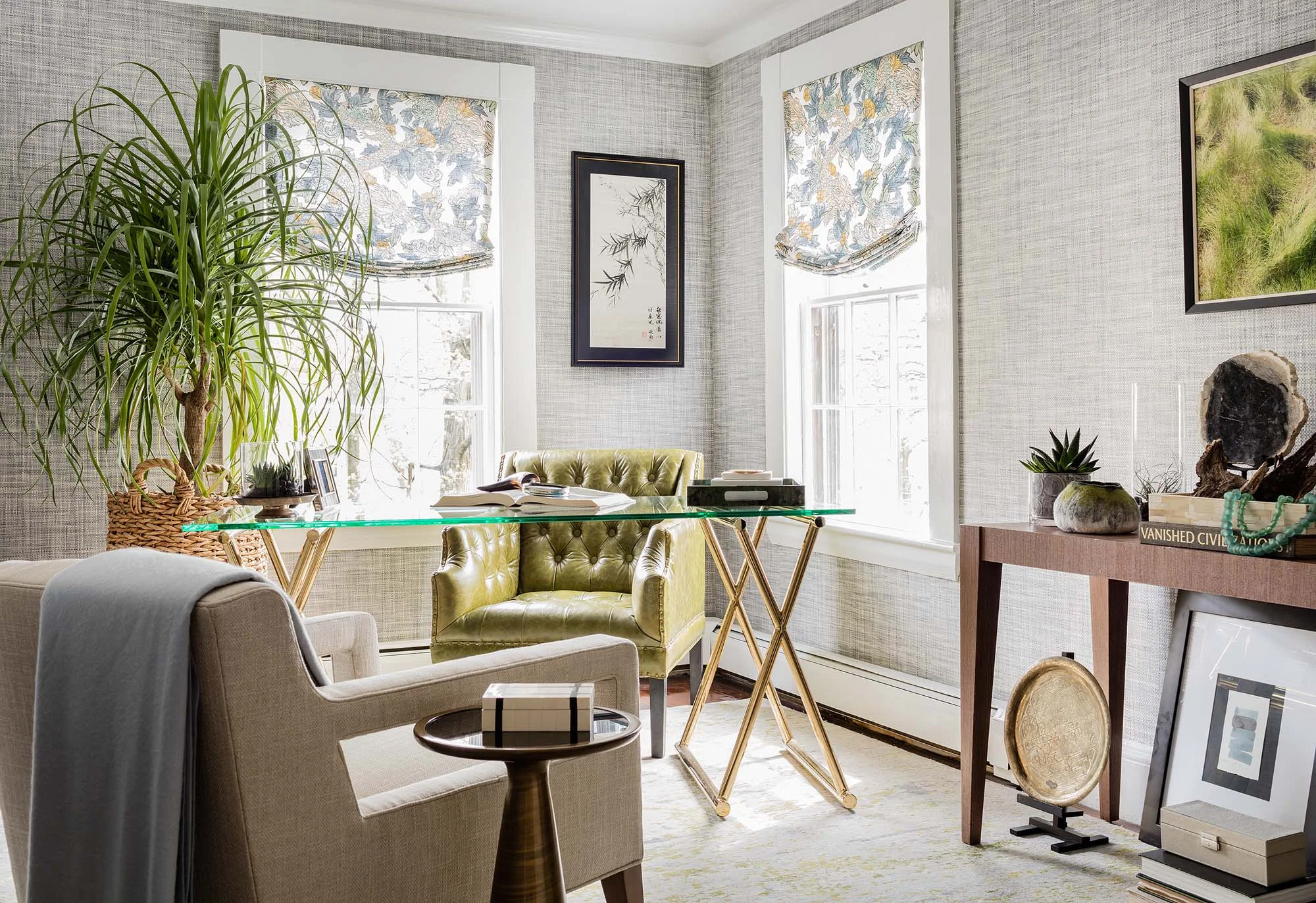 House interior with armchairs, glass table, wooden table, indoor plants and frames on the wall, phillip jeffries, wallpaper, driftwood, twilight, mitchell gold bob williams, duke chair,