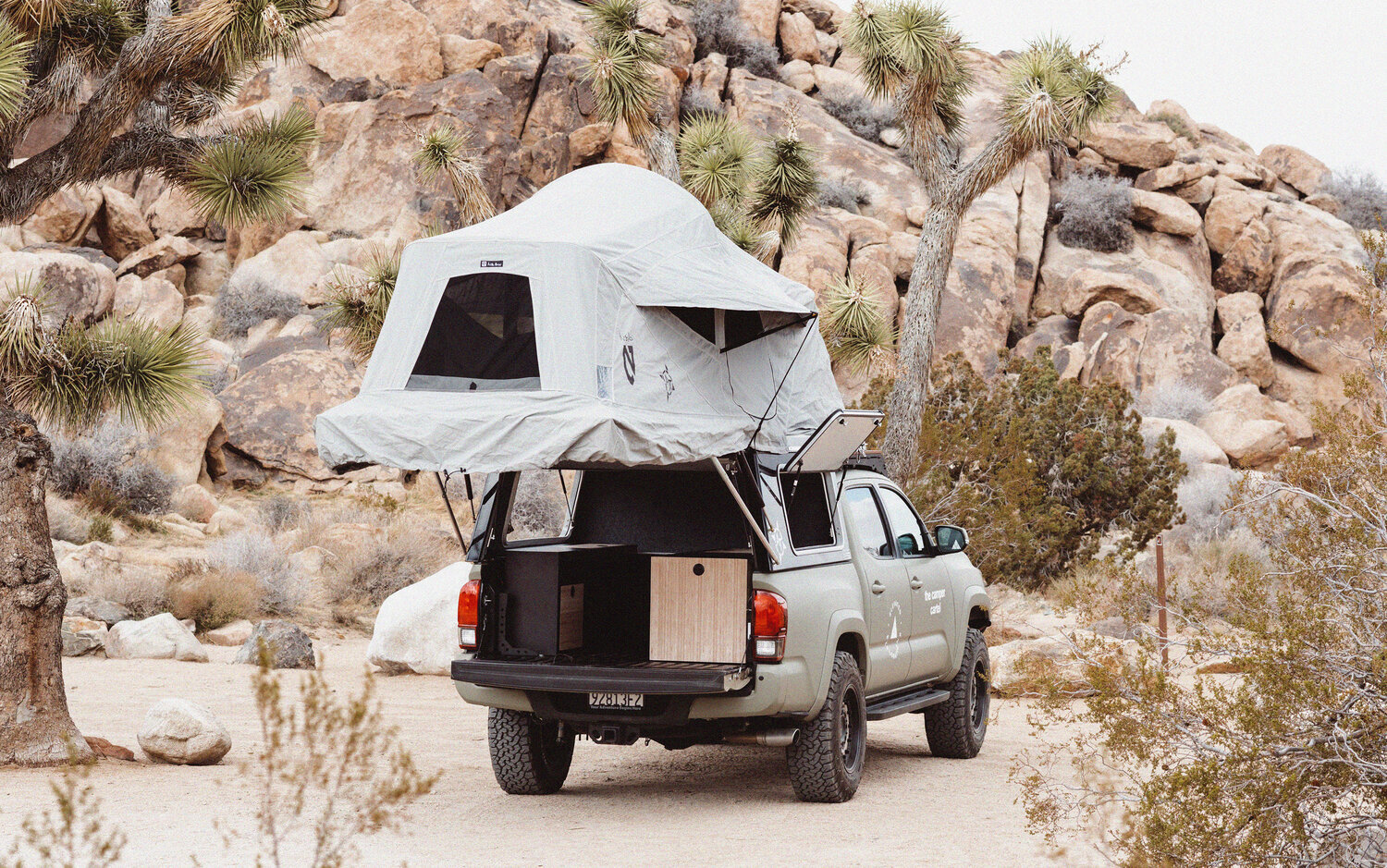 s-adventurer-toyota-tacoma-campervan-camper-cartel-exterior-rear-expanded.jpg