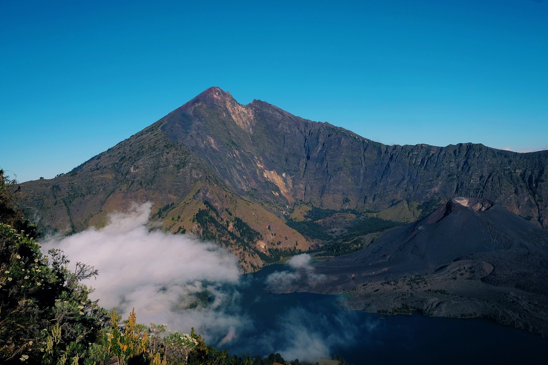 The summit of Mount Rinjani from the opposite peak.