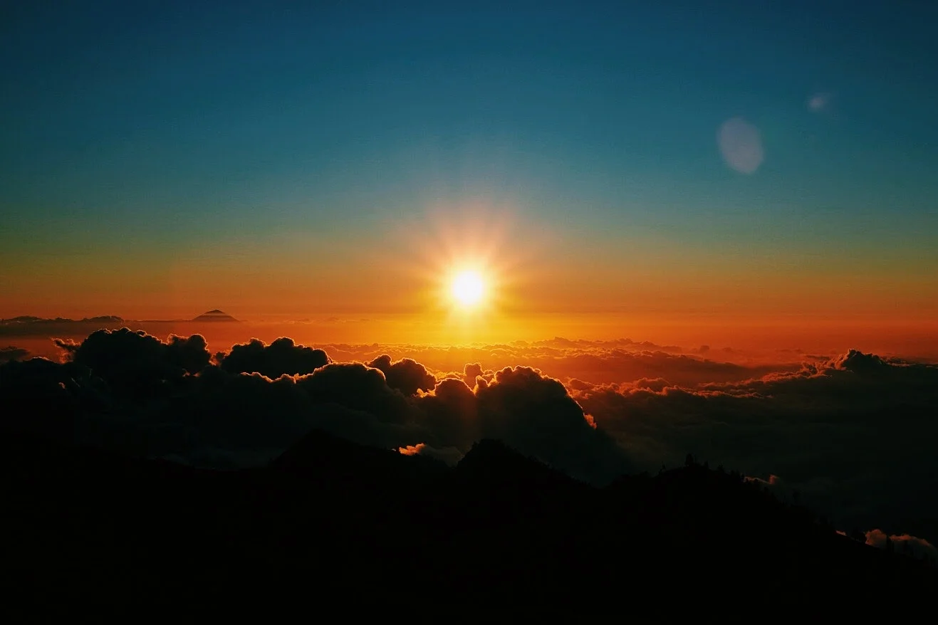 Mount Agung on Bali, as seen from Mount Rinjani at sunset.