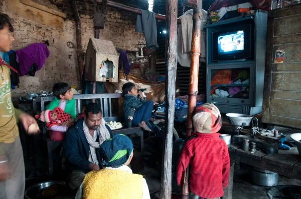Bollywood with breakfast for the Poori-walla and his family. The Indian border is no more than 30km from here.