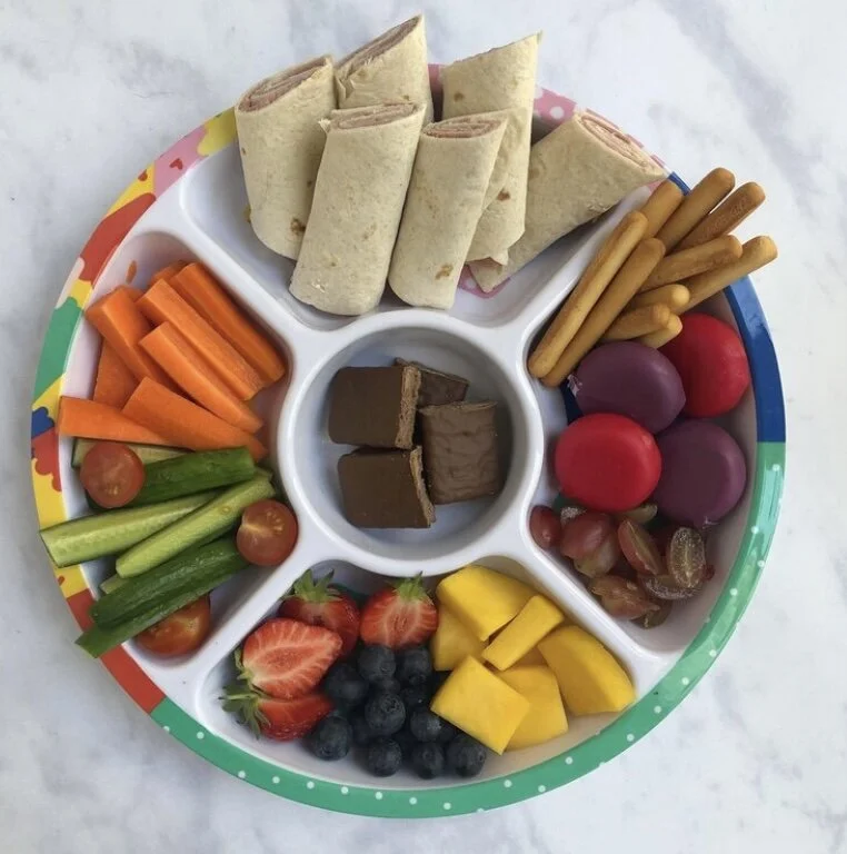 pick plate with lots of fruits and veggies