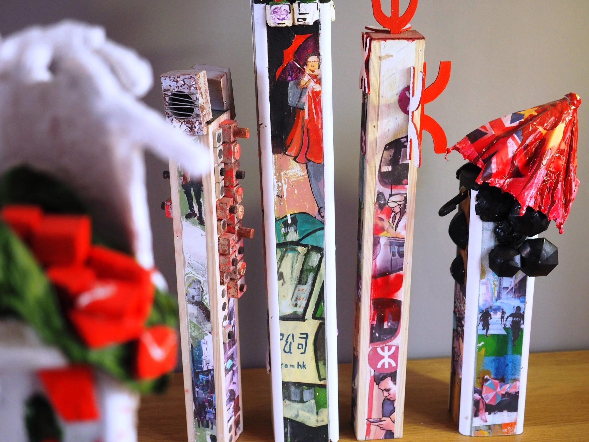 HongKong Stacks :- 3D Mixed media, series of 7. From 15 x 50 cms to 25 x 115 cms high