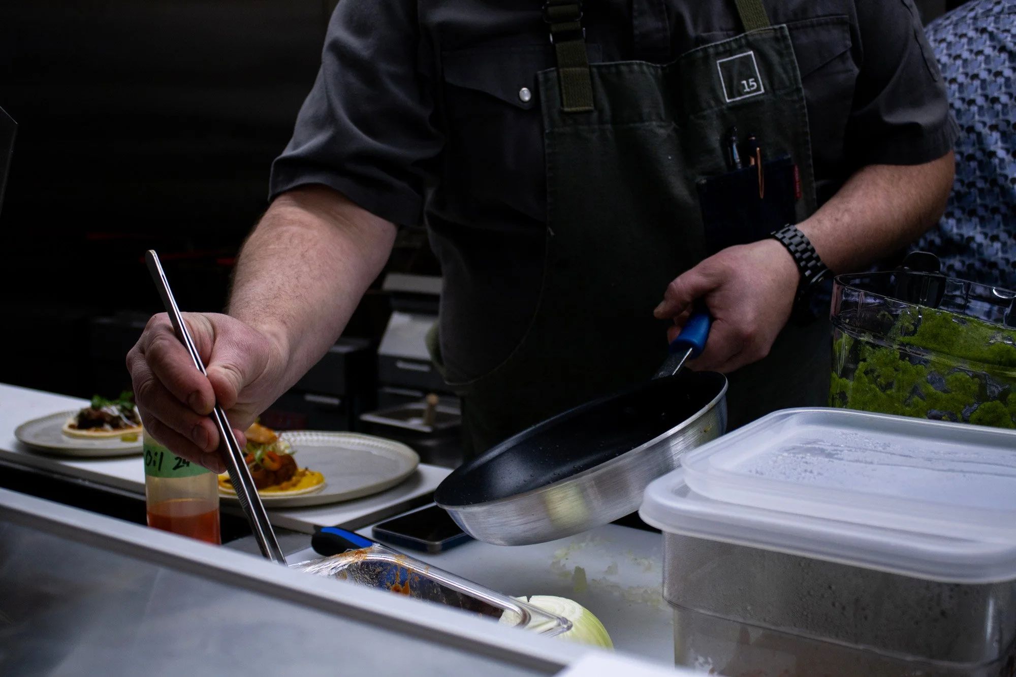 Executive Chef plating a meal during a training session