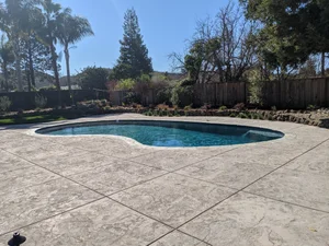 Completed poolside patio and outdoor hardscape project