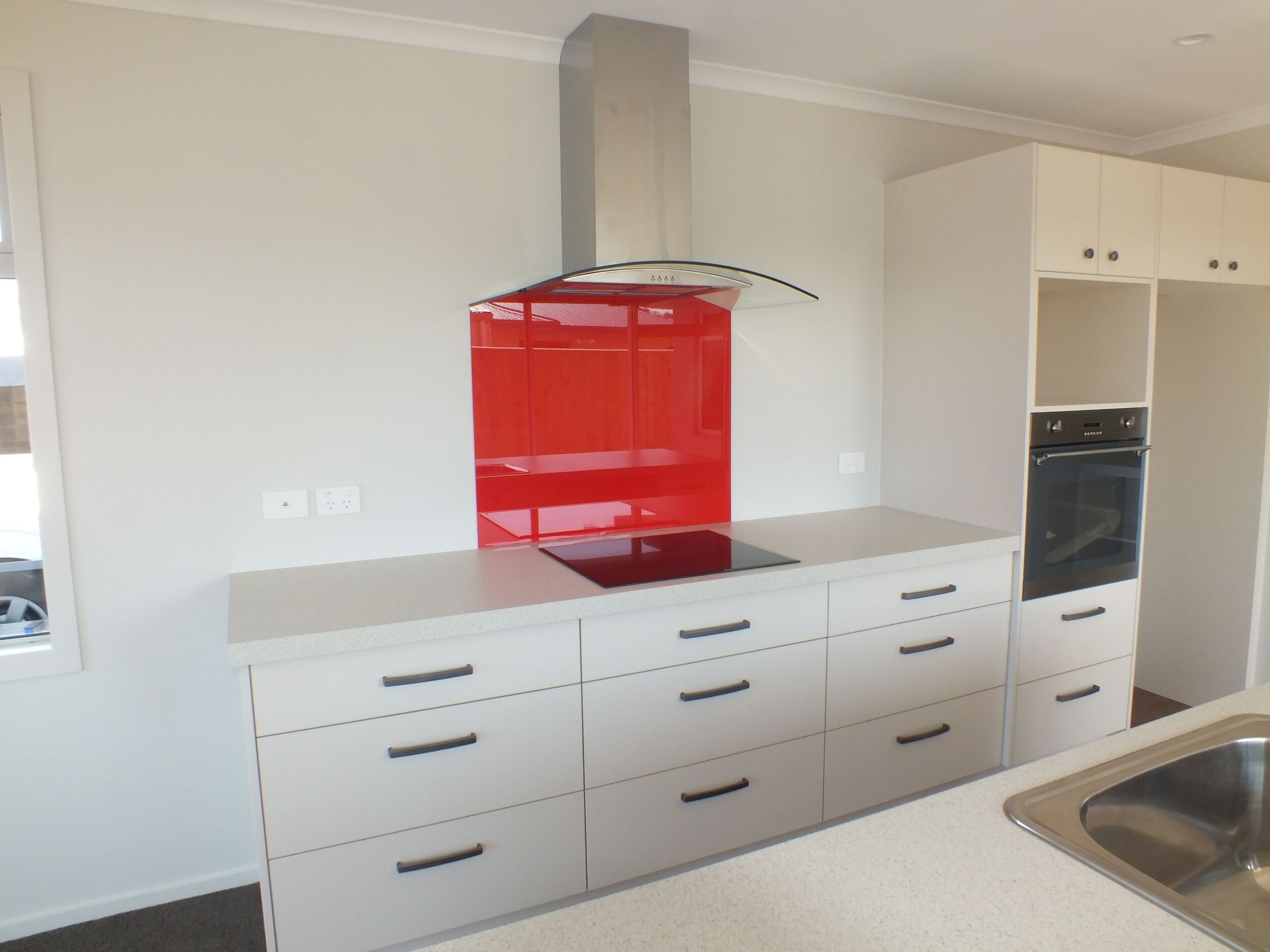 red splashback kitchen.jpg