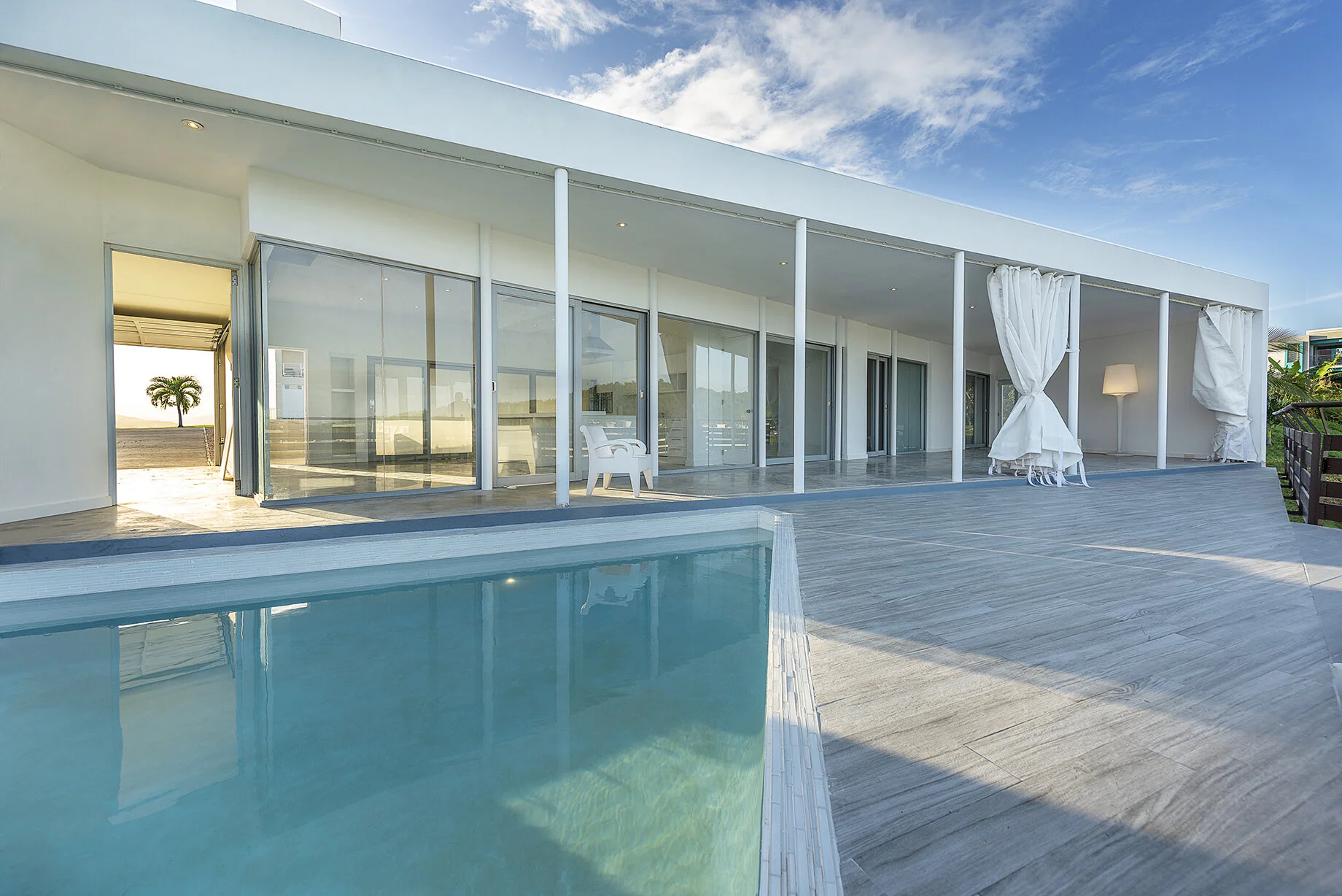 triangle_pool_open_curtains_Terrace_Casa_Flores_architecture_Puerto_rico_fuster_architects_house (Photo by Jaime Navarro).jpg